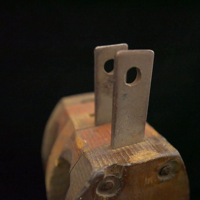 Antique 13-inch double sheave wooden block pulley.