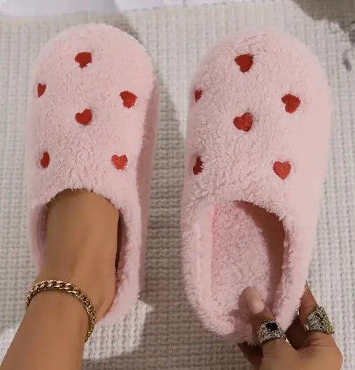 Mandotos Cushy Heart Top Fluffy Slippers with soft, plush material and heart-shaped design for cozy indoor wear.