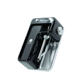Black DaySavers filling machine angled on white background with compact tray and tube assembly