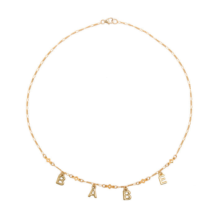 Fraiser Sterling Star Crossed Lover Babe Choker in gold with lettering charm pendant on statement choker — front view
