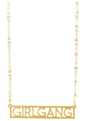 Wanderlust + Co Girlgang Necklace in gold with girlgang font pendant on 24k plated stainless steel chain necklace — front view
