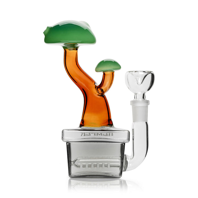 Profile shot of Hemper bonsai bong with jade “tree top” detail and amber body, compact glass bong for smooth diffusion