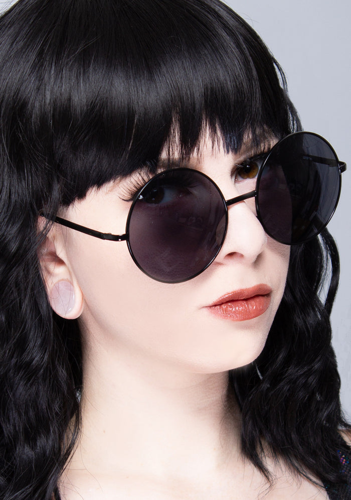 LASR Road Trip Round Sunglasses in Black — front view