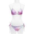 Wildfox Swim Fairy Hologram Ruffle String Bikini Bottom in pastel rainbow with ruffle detail on hologram print polyester spandex festival swimwear — front view