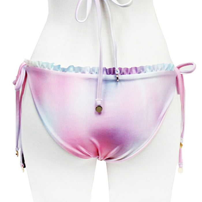Wildfox Swim Fairy Hologram Ruffle String Bikini Bottom in pastel rainbow with ruffle detail on hologram print polyester spandex festival swimwear — back view