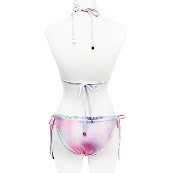 Wildfox Swim Fairy Hologram Ruffle String Bikini Bottom in pastel rainbow with ruffle detail on hologram print polyester spandex festival swimwear — model view