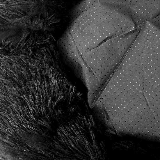 Close-up of the U&C Fur Bed (Petite) in black