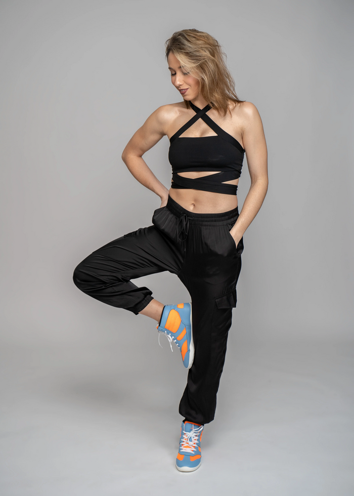 Women wearing Vigor hi top unisex dance sneaker blue & orange retro